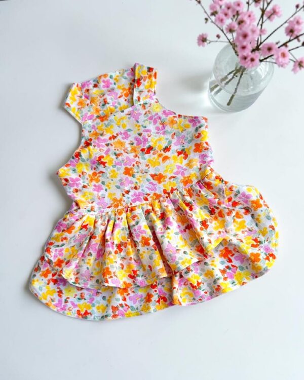 WhatsApp Image 2026-04-09 at 7.52.13 AM VESTIDO FLOWER - Ropa para perros y gatos